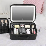 Charger l'image dans la galerie, Trousse de maquillage de voyage avec miroir lumineux LED – Luminosité et rangement réglables
